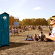 Image for article titled Woman Beelining For Music Festival Porta Potties Must Have Come Specifically To See Them